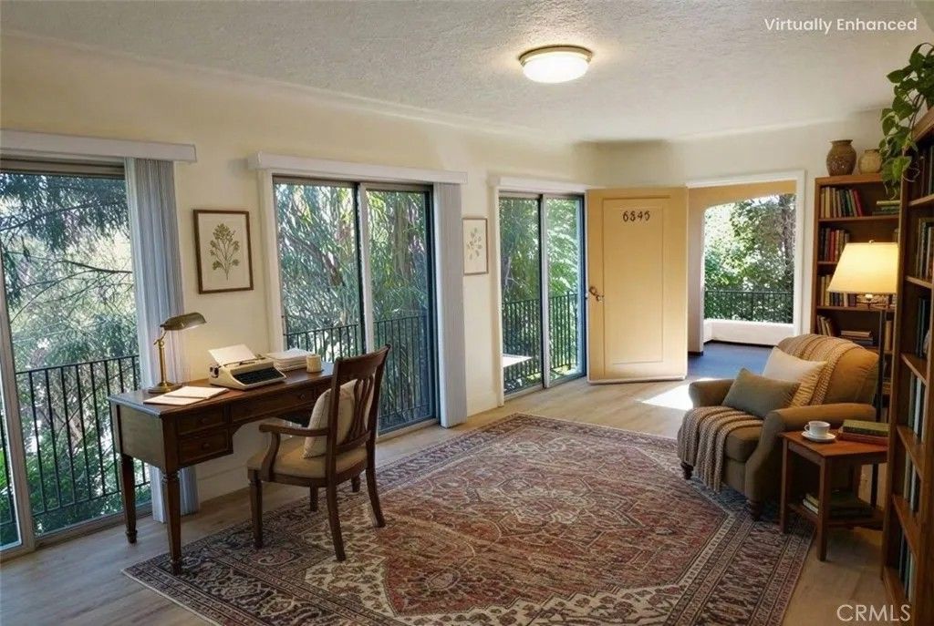 Photo of 6845 Alta Loma Terrace, Los Angeles, CA 90068 (MLS # GD26000687)