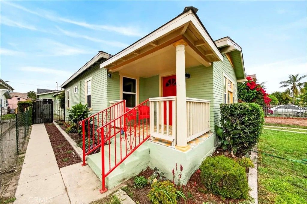 Photo of 917 W 50th Place, Los Angeles, CA 90037 (MLS # SB26030174)