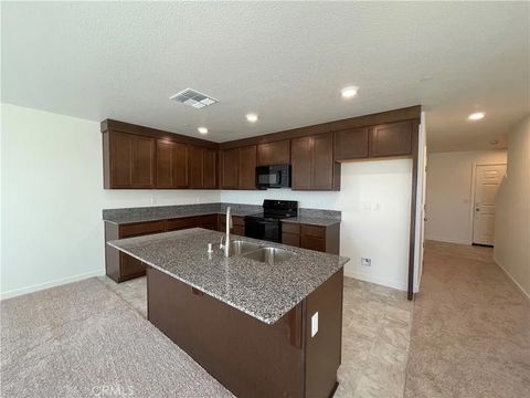 Photo of 732 Stone Ridge East Avenue, Merced, CA 95341 (MLS # MC26094809)