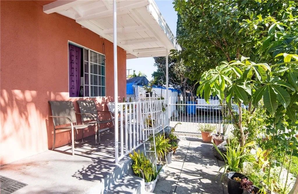 Photo of 1215 E 91st St, Los Angeles, CA 90002 (MLS # DW26017658)