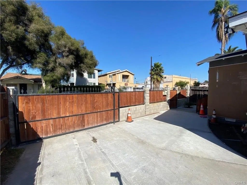 Photo of 1018 W 67th St, Los Angeles, CA 90044 (MLS # PW26081591)