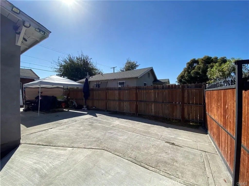 Photo of 1018 W 67th St, Los Angeles, CA 90044 (MLS # PW26081591)