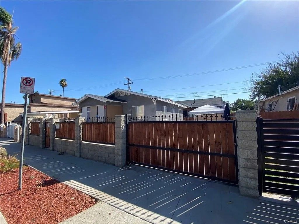 Photo of 1018 W 67th St, Los Angeles, CA 90044 (MLS # PW26081591)