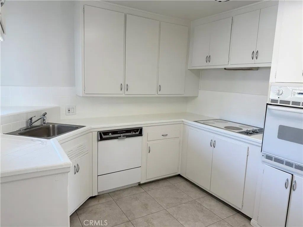 Photo of 9822 Joyzelle Dr, Garden Grove, CA 92841 (MLS # OC26029488)