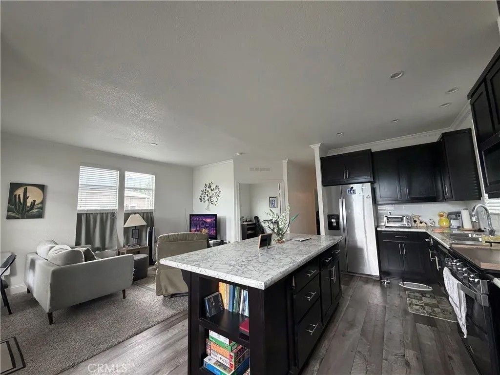 Photo of 21001 Plummer, Chatsworth, CA 91311 (MLS # SR26081741)