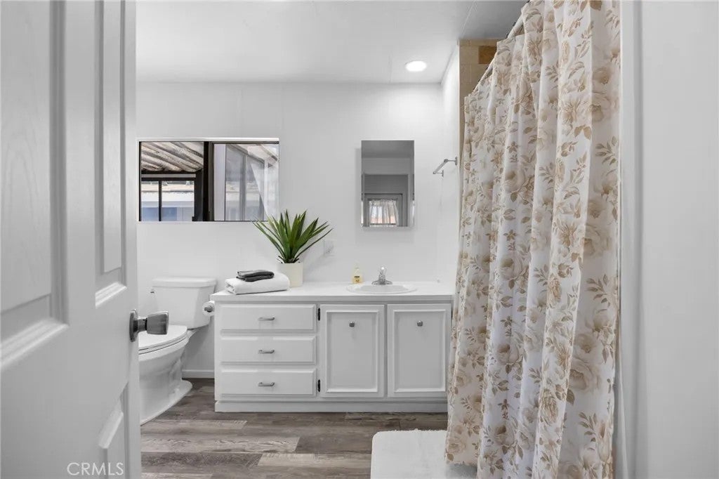 Photo of 995 Pomona Rd #88, Corona, CA 92882 (MLS # DW26096476)