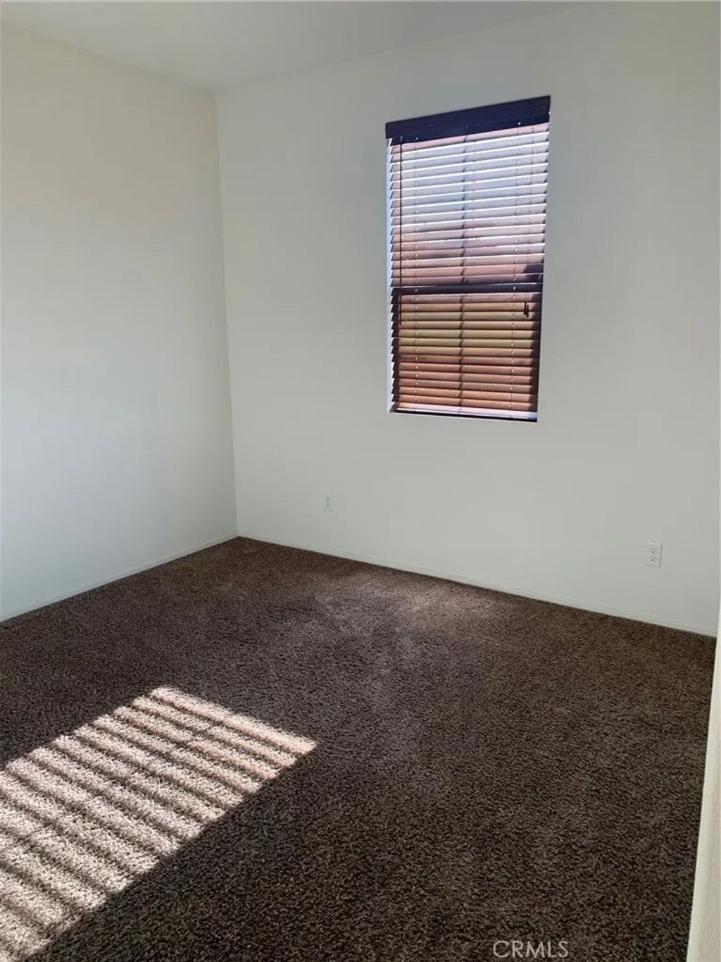 Photo of 15038 Paseo Verde Place Row, Victorville, CA 92394 (MLS # SB26049826)