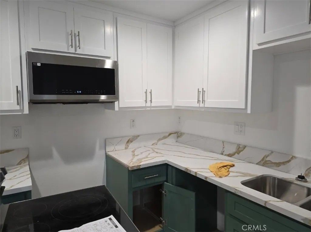 Photo of 1319 E 59th Place, Los Angeles, CA 90001 (MLS # PW26012543)