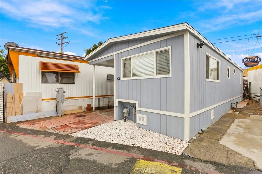 Photo of 16118 Bellflower BLVD #48, Bellflower, CA 90706 (MLS # DW26229454)