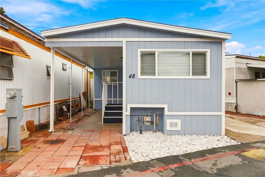 Photo of 16118 Bellflower BLVD #48, Bellflower, CA 90706 (MLS # DW26229454)