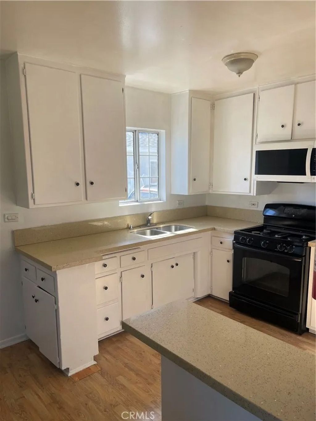 Photo of 10979 Cassina Ave #A, South Gate, CA 90280 (MLS # TR26020492)