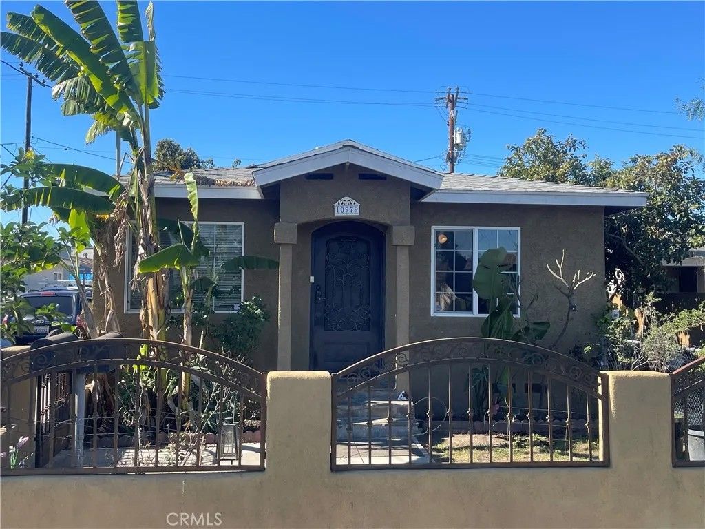 Photo of 10979 Cassina Ave #A, South Gate, CA 90280 (MLS # TR26020492)