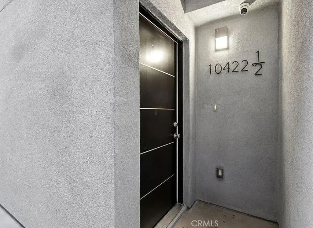 Photo of 10422 Graham Avenue, Los Angeles, CA 90003 (MLS # PW26026705)