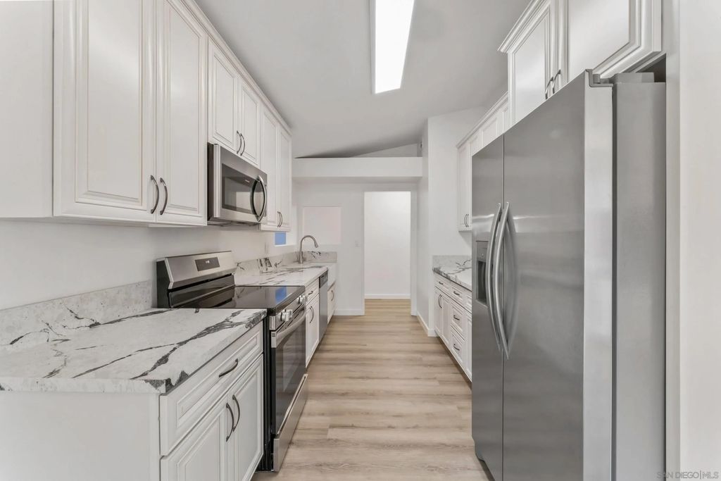 Photo of 2663 Tonto Way, San Diego, CA 92117 (MLS # 260005219)