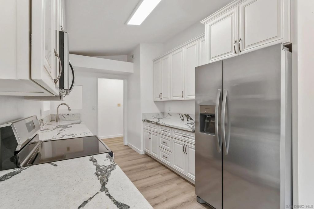 Photo of 2663 Tonto Way, San Diego, CA 92117 (MLS # 260005219)