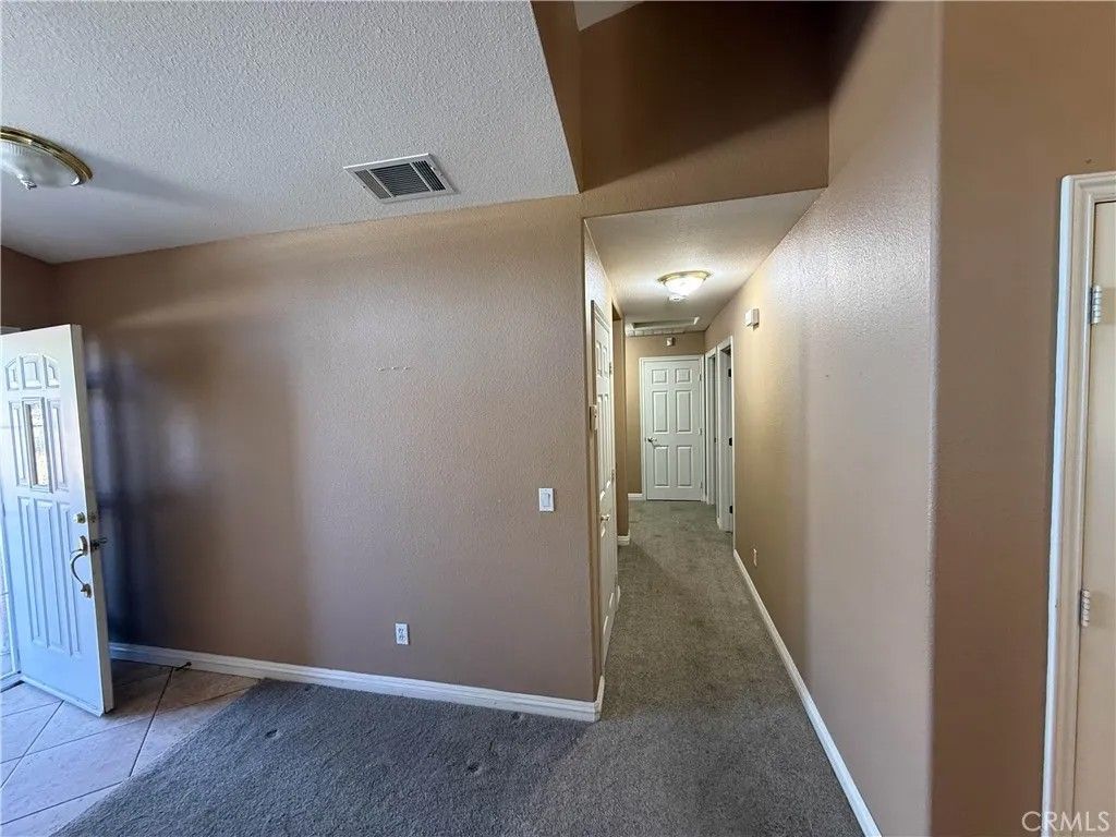 Photo of 6585 Escondido Ave, Oak Hills, CA 92344 (MLS # IG26081180)