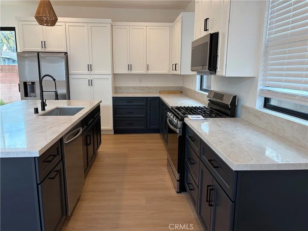 Photo of 19214 Calvert Street, Tarzana, CA 91335 (MLS # SR26008036)