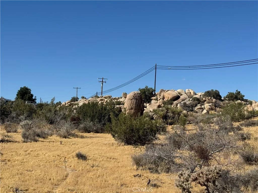 Photo of 57100 Moffett LN, Yucca Valley, CA 92284 (MLS # PW26100660)