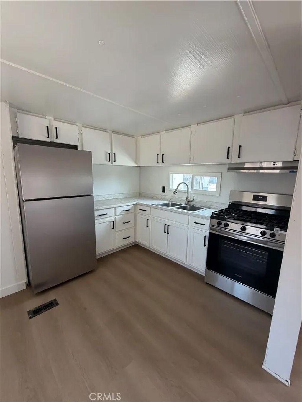 Photo of 17971 Jonathan ST #20, Adelanto, CA 92301 (MLS # HD26103823)
