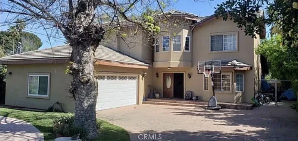 Photo of 5224 Woodlake, Woodland Hills, CA 91367 (MLS # SR26007806)