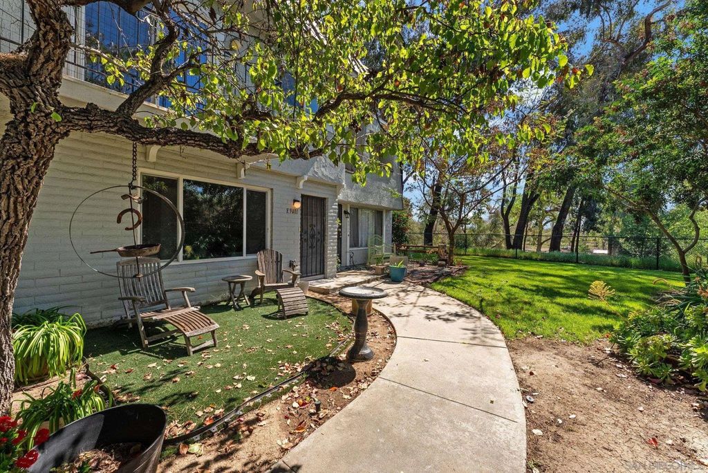 Photo of 9401 Carlton Oaks Dr Unit E Dr, Santee, CA 92071 (MLS # 260005900)