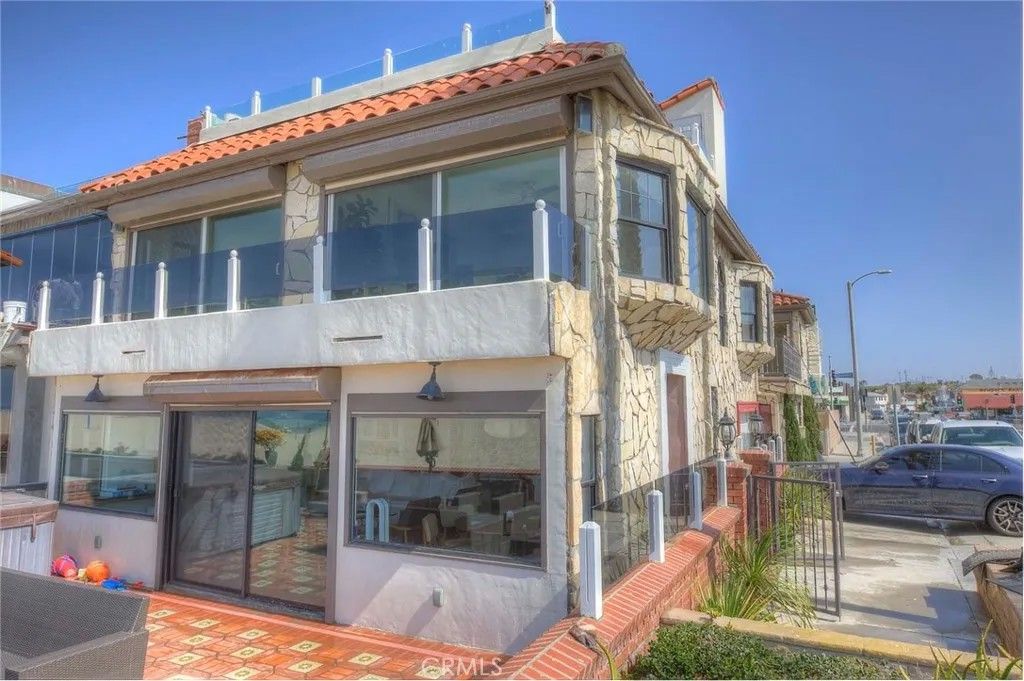 Photo of 6800 W Oceanfront, Newport Beach, CA 92663 (MLS # OC25239462)