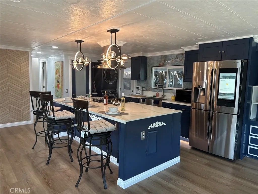 Photo of 8801 Eton Ave, Canoga Park, CA 91304 (MLS # SR26081739)