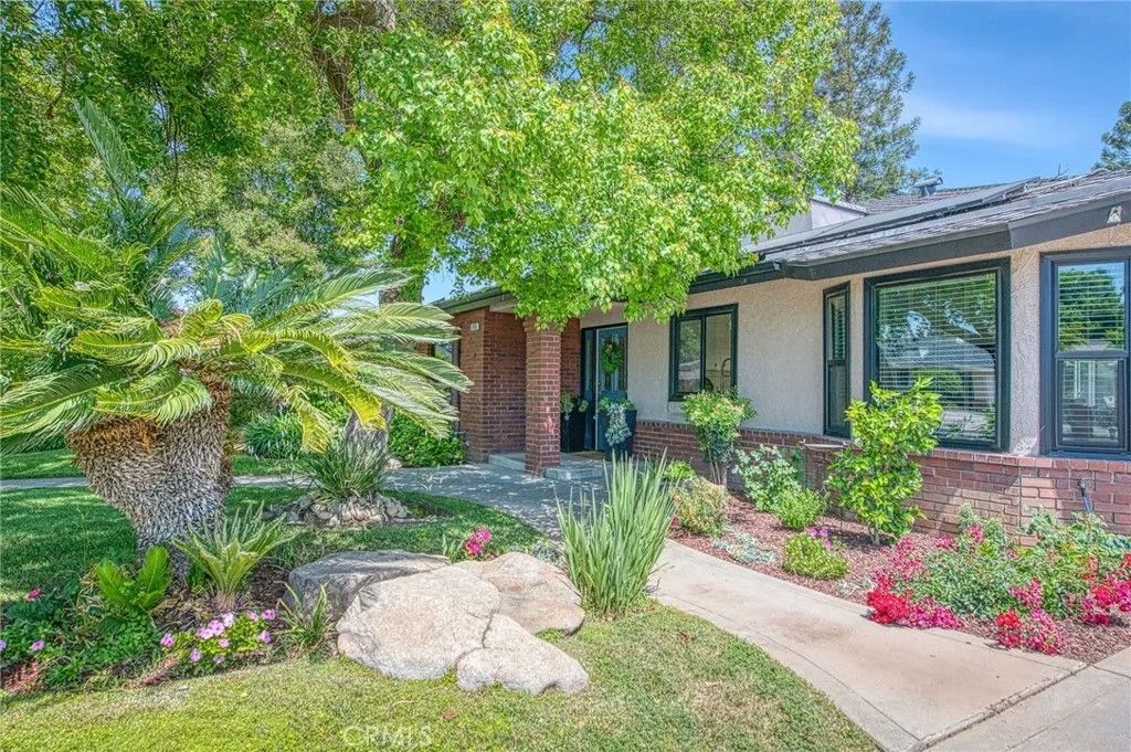 Photo of 7668 N Hayston Ave, Fresno, CA 93720 (MLS # FR26089942)