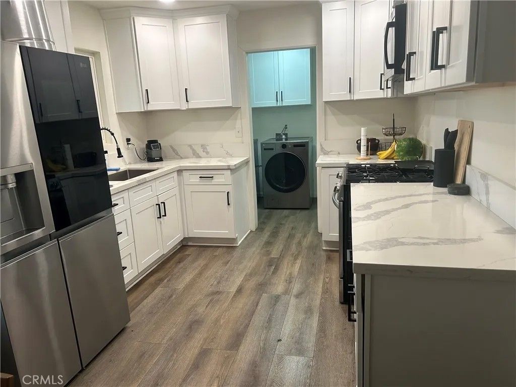 Photo of 221 Matich Street, Lake Elsinore, CA 92530 (MLS # PW25191212)