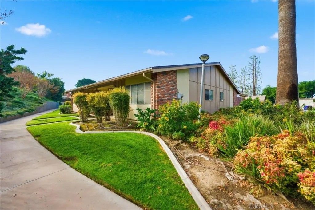 Photo of 22745 Palm Avenue #H, Grand Terrace, CA 92313 (MLS # IV25277649)