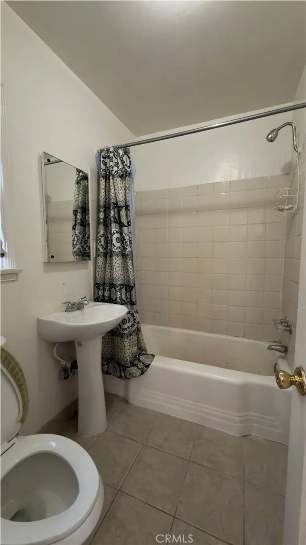 Photo of 1352 W 60th Pl, Los Angeles, CA 90044 (MLS # SR26072670)