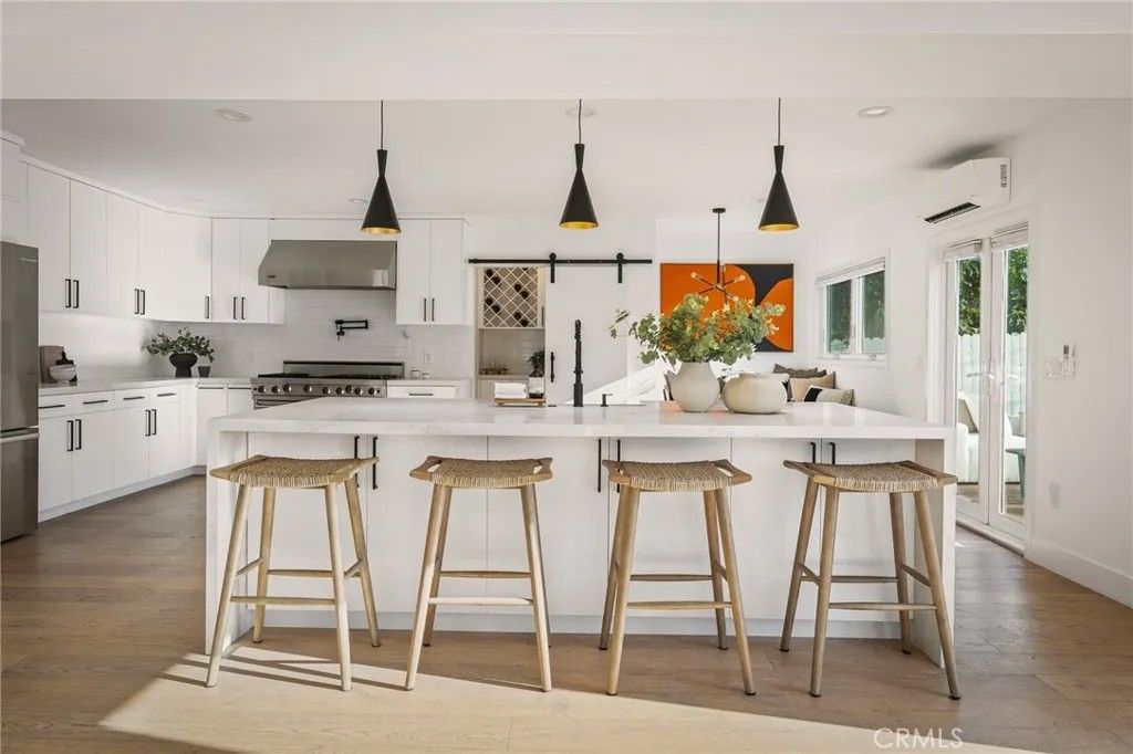 Photo of 5115 West Boulevard, Los Angeles, CA 90043 (MLS # OC26002861)