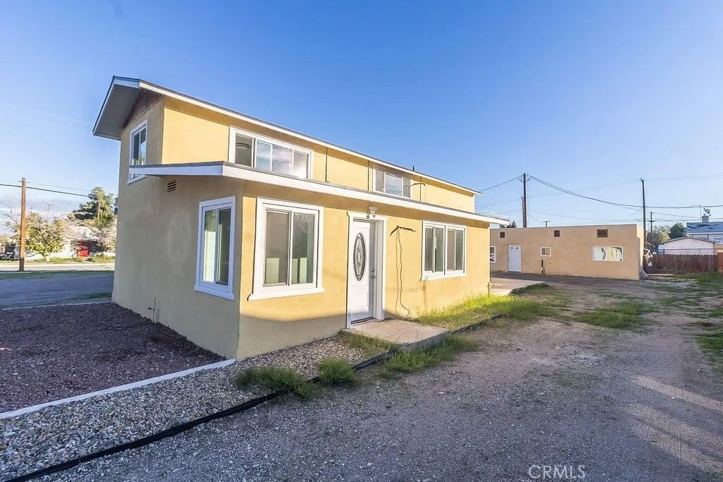 Photo of 107 Walnut St, Needles, CA 92363 (MLS # JT26007191)