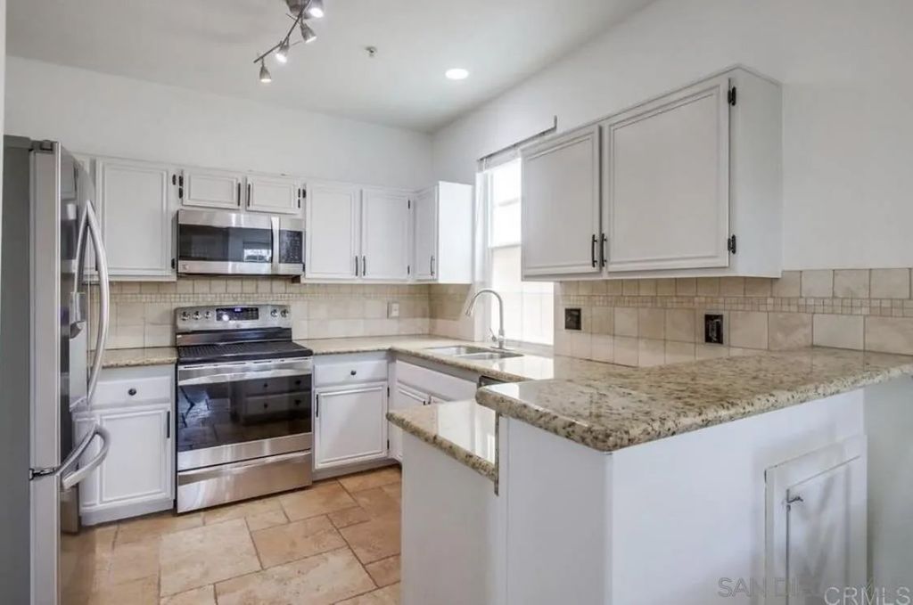 Photo of 18650 Caminito Cantilena #283, San Diego, CA 92128 (MLS # 250044496)