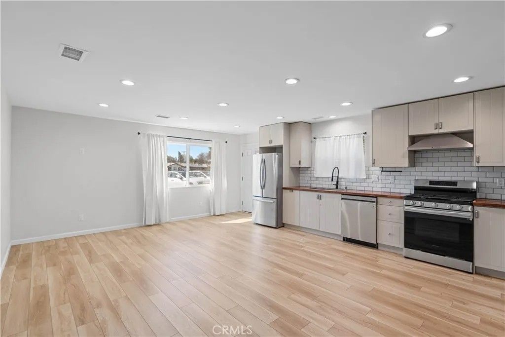 Photo of 22229 Covello Street, Canoga Park, CA 91303 (MLS # GD26010451)