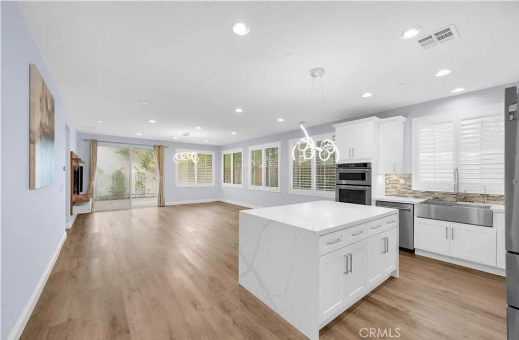 Photo of 110 Desert Bloom, Irvine, CA 92618 (MLS # OC25234947)