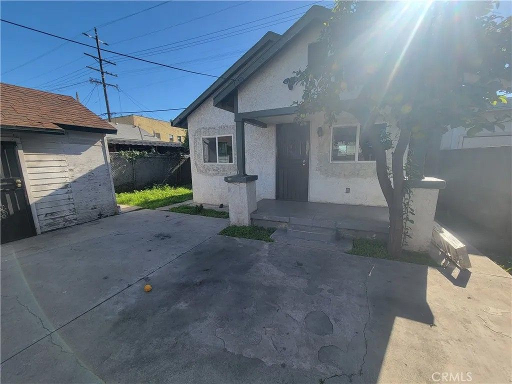 Photo of 204 E Gage Ave, Los Angeles, CA 90003 (MLS # DW26006267)
