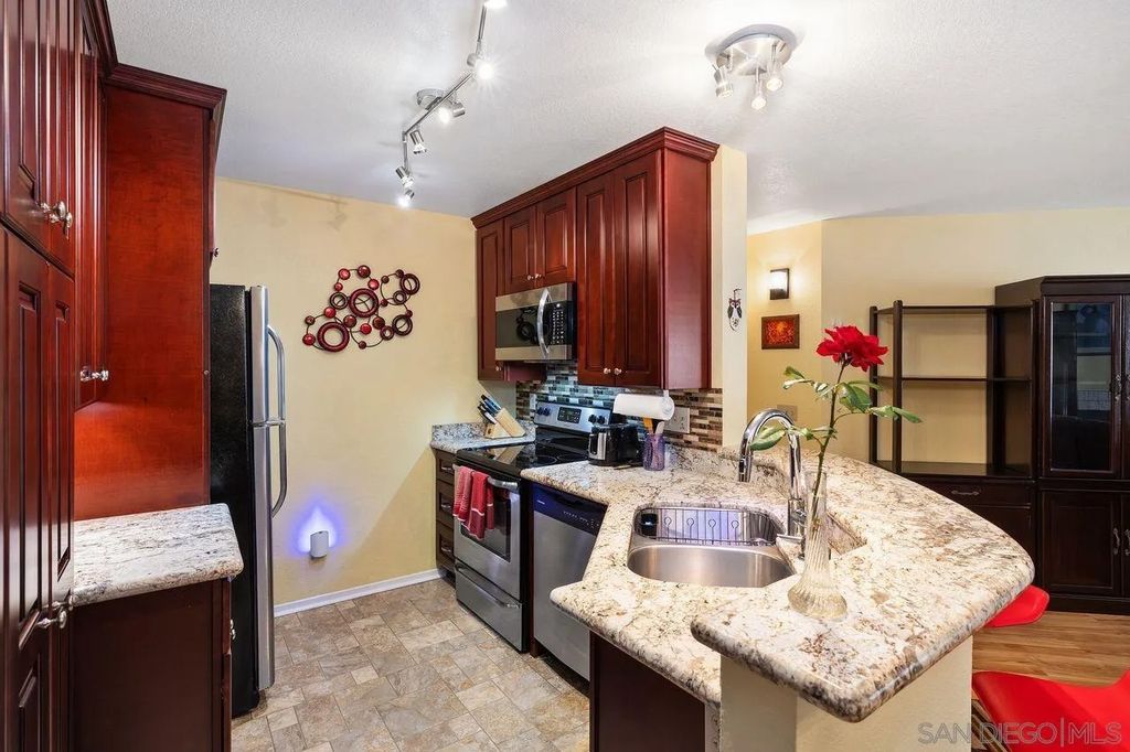 Photo of 7263 Camino Degrazia #33, San Diego, CA 92111 (MLS # 260005822)