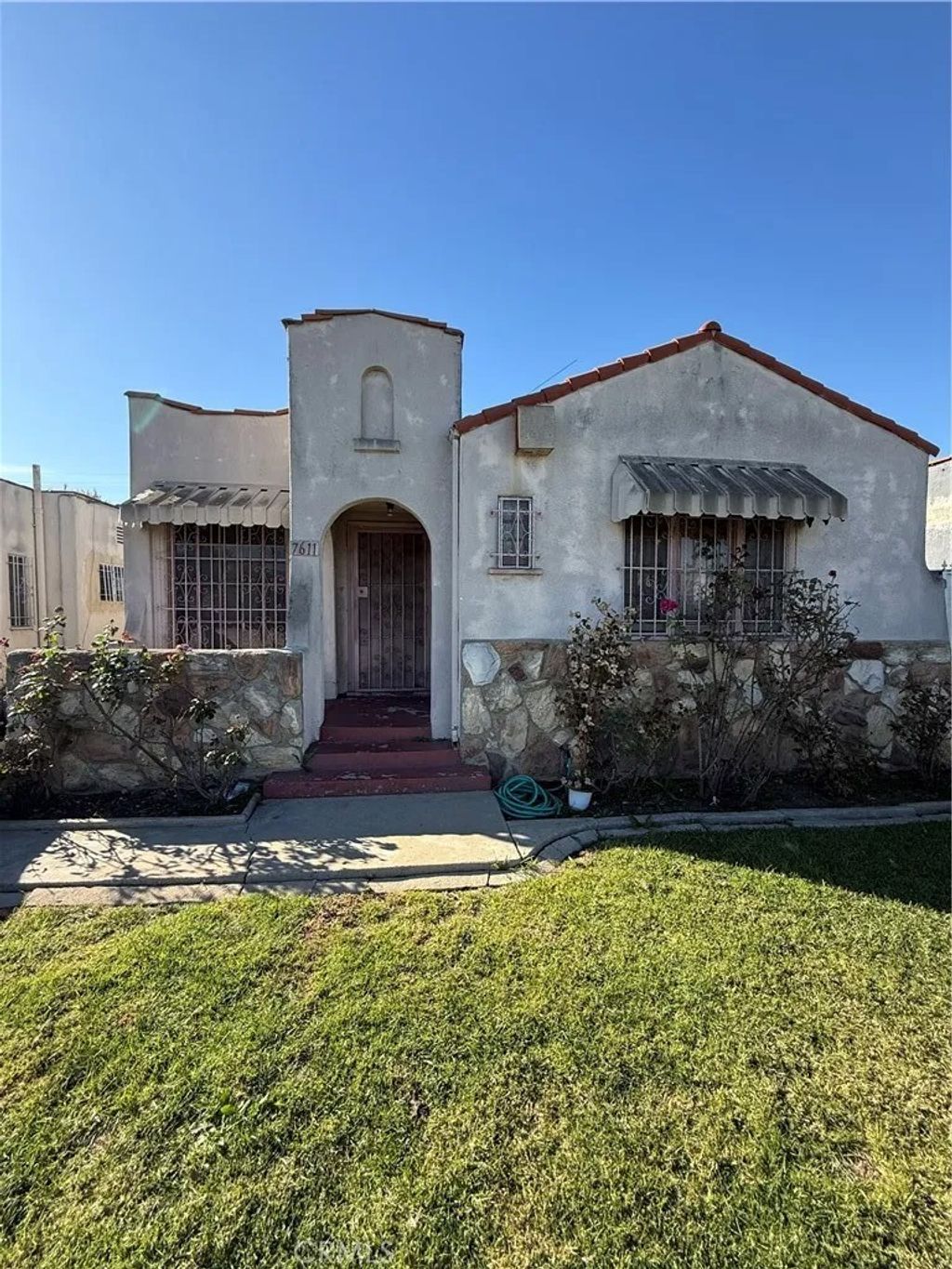 Photo of 7611 S Hobart Blvd, Los Angeles, CA 90047 (MLS # TR26012156)