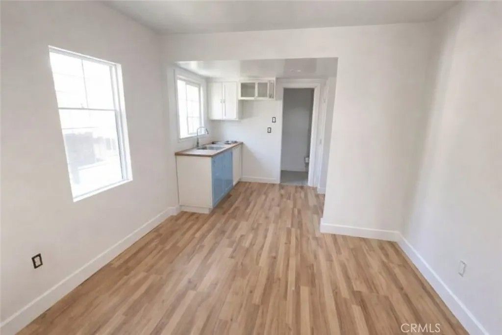 Photo of 1344 E 43rd Pl, Los Angeles, CA 90011 (MLS # DW26069521)