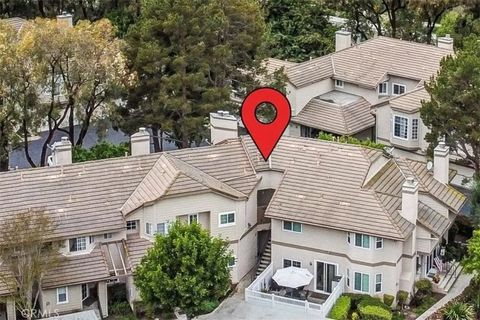 Photo of 24378 Larchmont Court #67, Laguna Hills, CA 92653 (MLS # SW26020325)