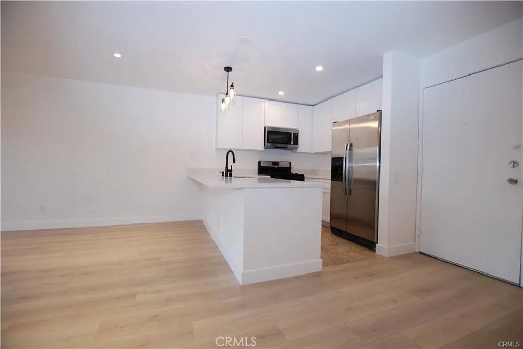 Photo of 6820 Remmet Ave, Canoga Park, CA 91303 (MLS # SR26049408)