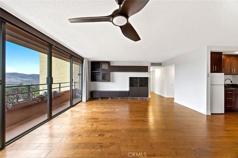 Photo of 24055 Paseo Del Lago, Laguna Woods, CA 92637 (MLS # OC25239169)