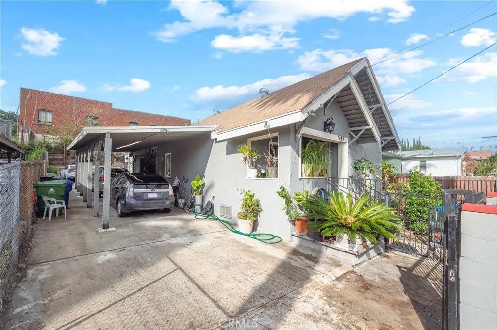 Photo of 949 Hollins Street, Los Angeles, CA 90023 (MLS # DW26005012)