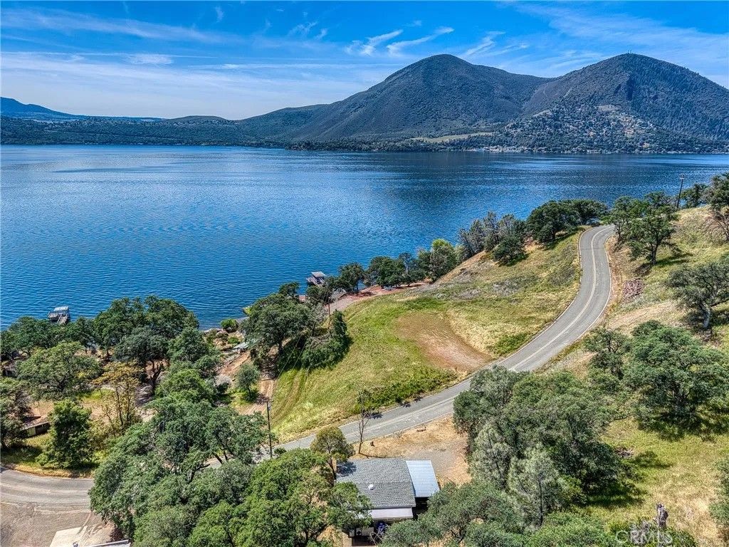 Photo of 10670 Lakeshore Drive, Clearlake, CA 95422 (MLS # LC26085011)