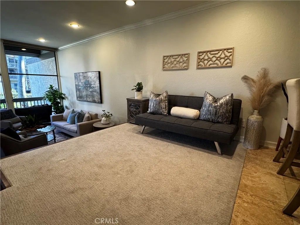 Photo of 5104 Marina Pacifica Drive, Long Beach, CA 90803 (MLS # PW26012261)