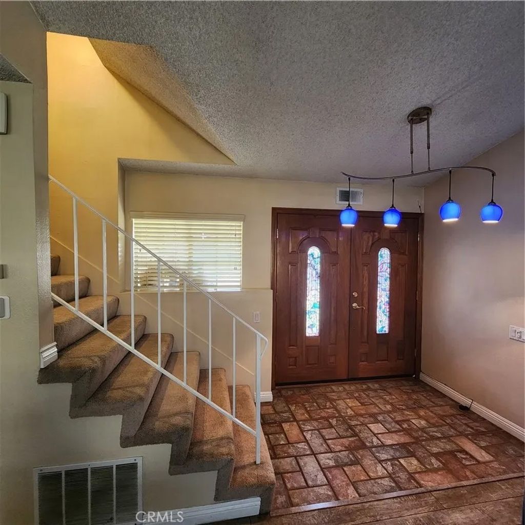 Photo of 5573 Pueblo Court, Commerce, CA 90040 (MLS # DW26013730)