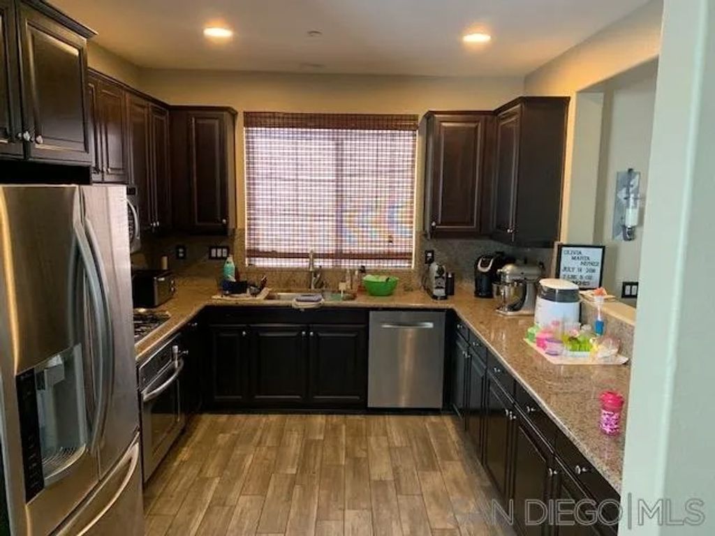 Photo of 3037 Cole Grade Dr, Santee, CA 92071 (MLS # 250041456)