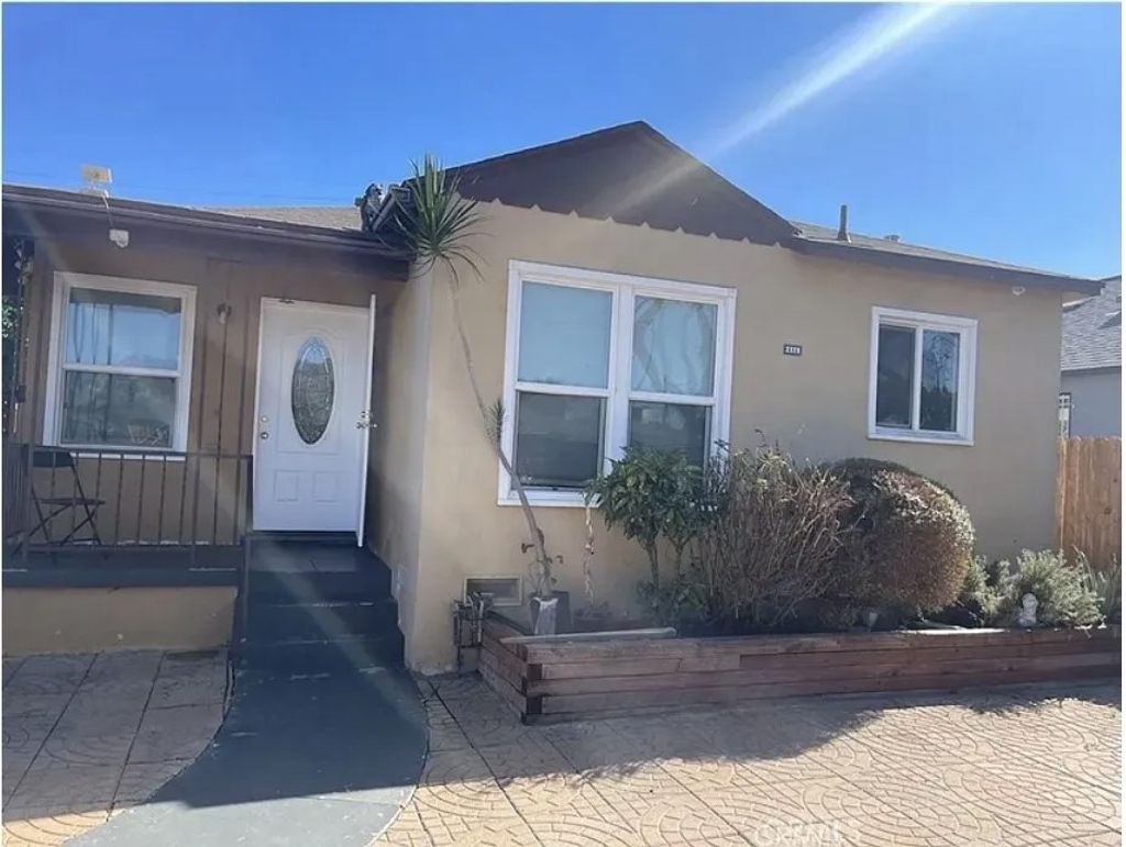 Photo of 644 E 88th Pl, Los Angeles, CA 90002 (MLS # DW26011926)