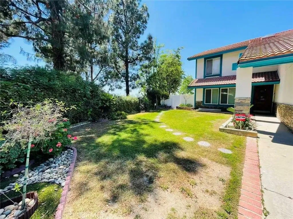 Photo of 20431 Huntcliff Ln, Walnut, CA 91789 (MLS # WS26082628)